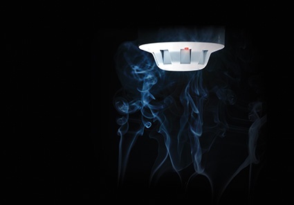 A low-profile XP95 optical  smoke detector raising the alarm