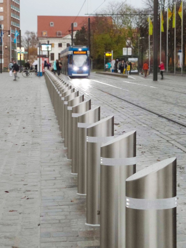 A combination of permanent and removable barriers ensures free access only for...