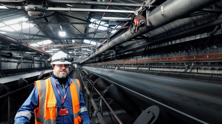 Steve Wilder shows a sensor unit sited a metre above the conveyors, one of...