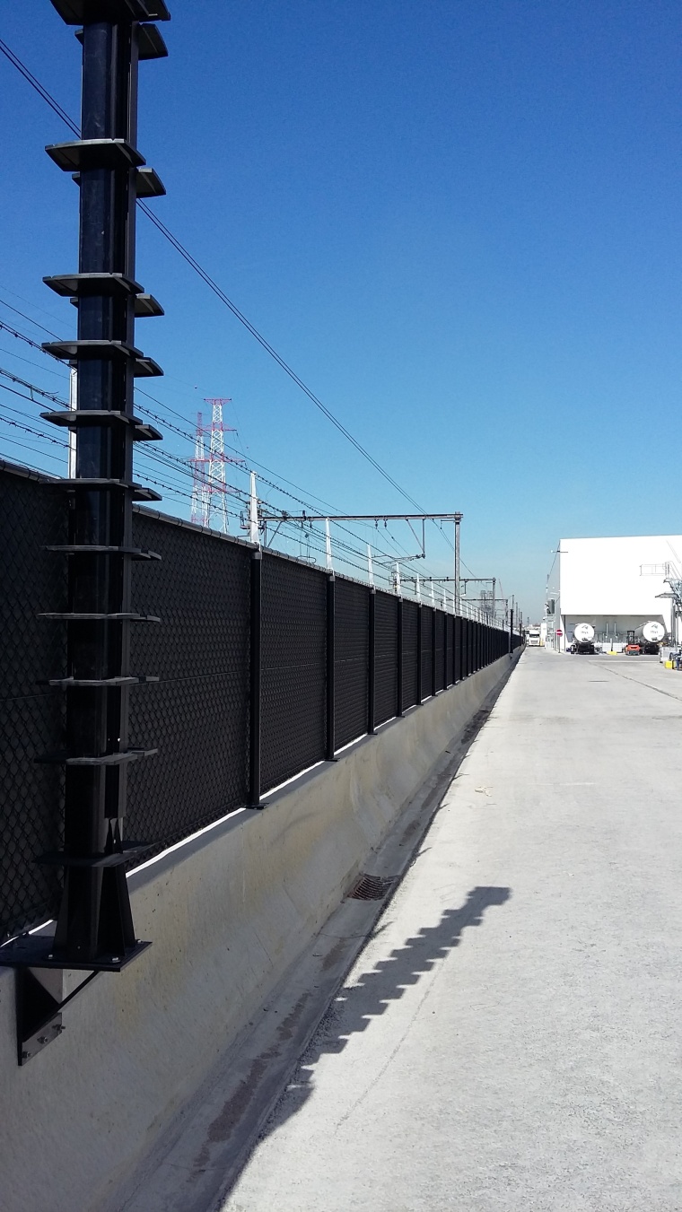 Self-contained infrared barrier columns form an invisible fence to detect...