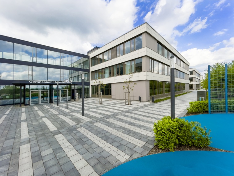 50,000 m² site, the Unterföhring school campus was equipped with lock...