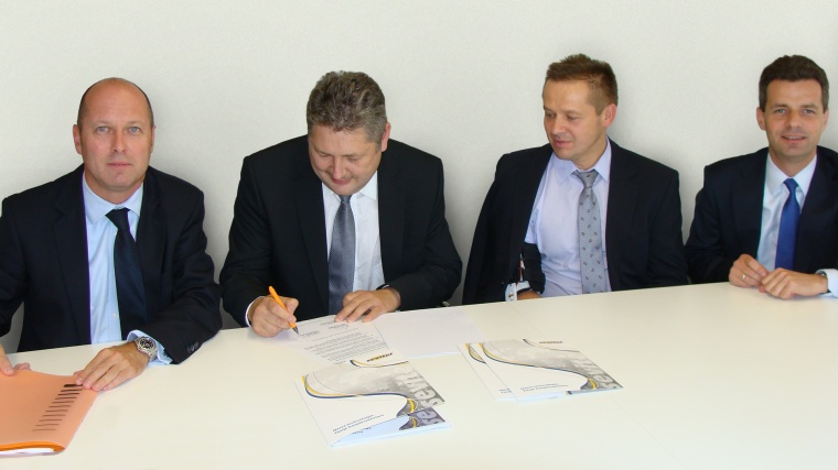 Horst Eckenberger (CEO), Grzegorz Galowy (President of the Board), Dariusz...