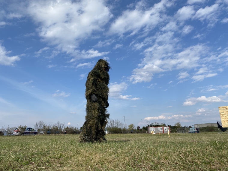 The systems are tested with complex camouflage and movement types.