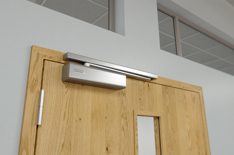 Assa Abloy Cam-Motion devices ensure that a fire door closes tightly. ©Assa...