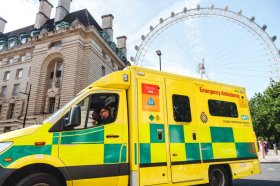 Emergency ambulance parked in central London with the London Eye in the background.